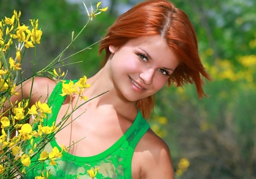 Violla A Busty Redhead Naked by Wild Yellow Flowers